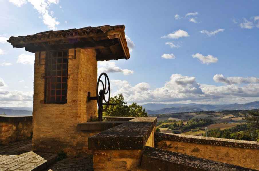 Umbria holidays: Montone medieval small village orange flag towns and villages. La Locanda del Capitano hotel restaurant